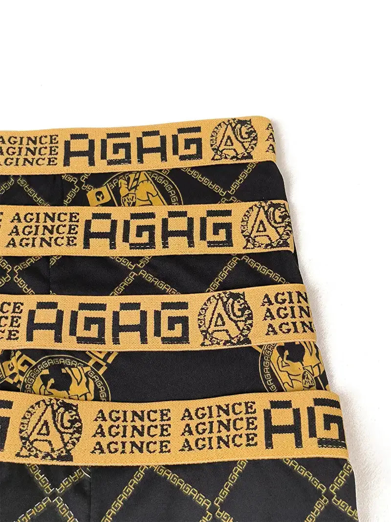 Men's boxer shorts 4pc set in black with gold waistband featuring AGAG branding and retro print