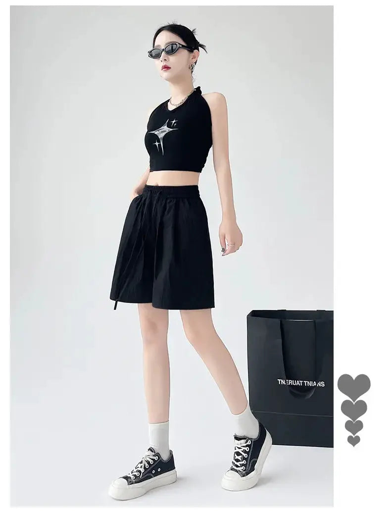 Women's black high-waisted shorts with two pockets and elastic waistband