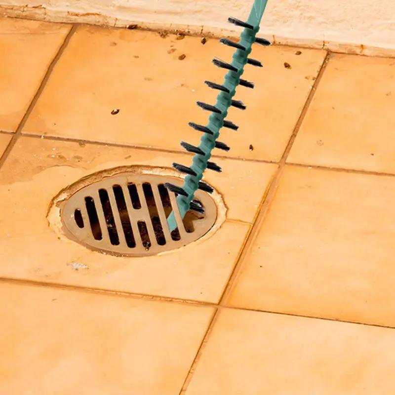 Deep Cleaning Brush for Washing Machine by Simples Market with extra-long teal handle and sponge bristles near a drain