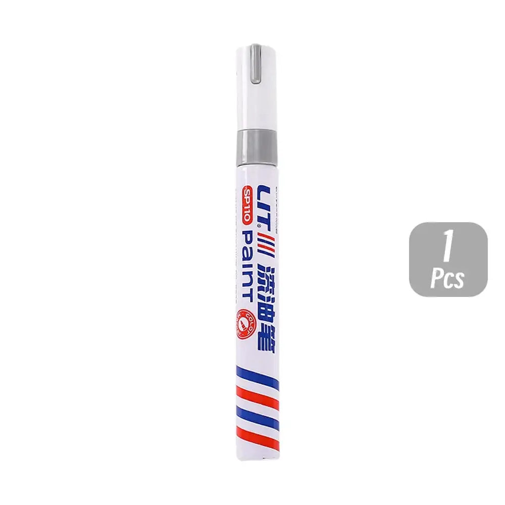 Permanent paint marker by Simples Market, white barrel with red and blue stripes and 3mm tip