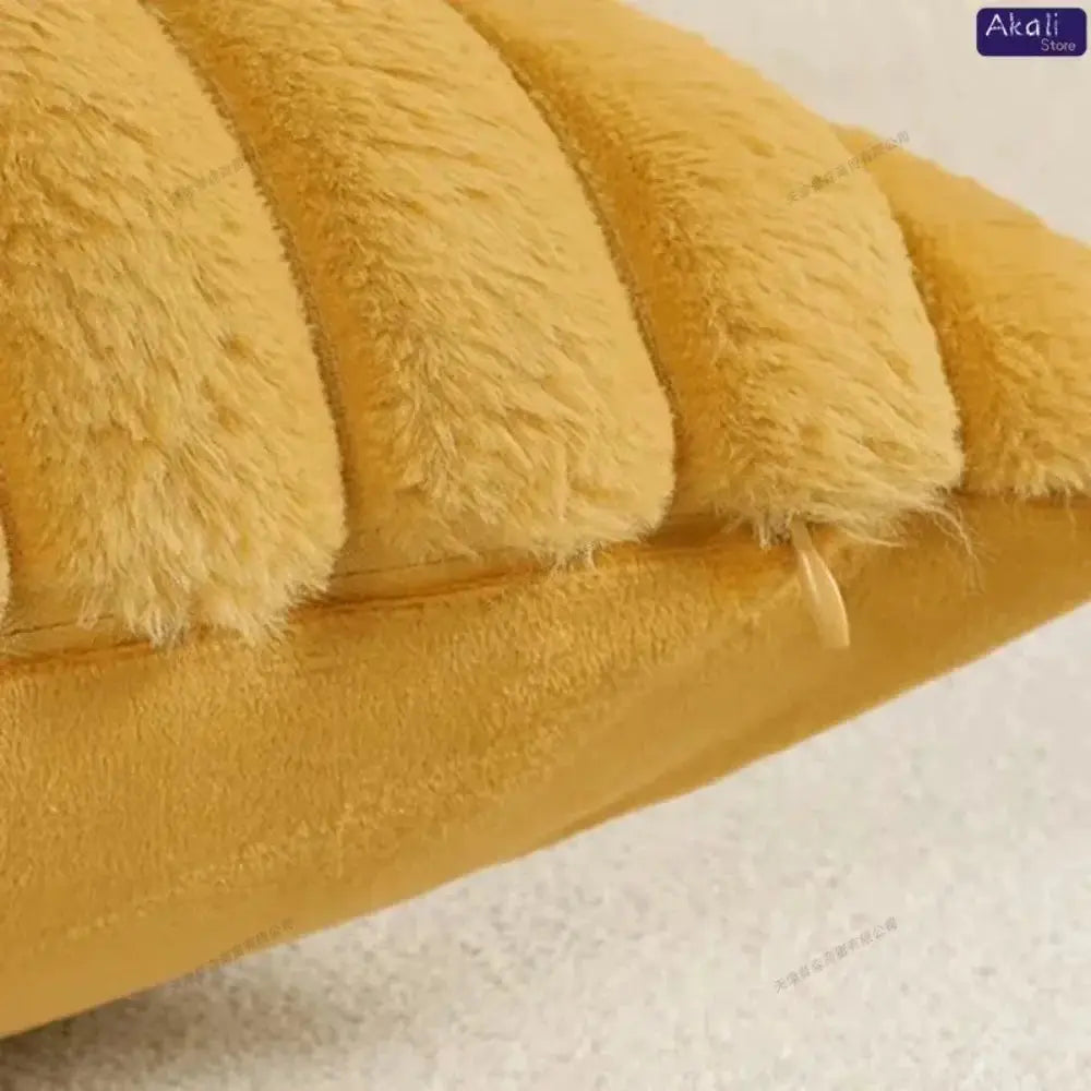 Simples Market faux rabbit fur cushion cover in mustard yellow with fluffy striped texture and side tab.