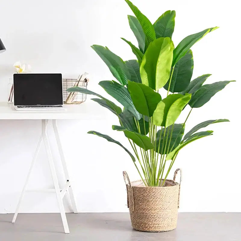 Simples Market artificial tropical palm plant in a woven basket with green plastic leaves.