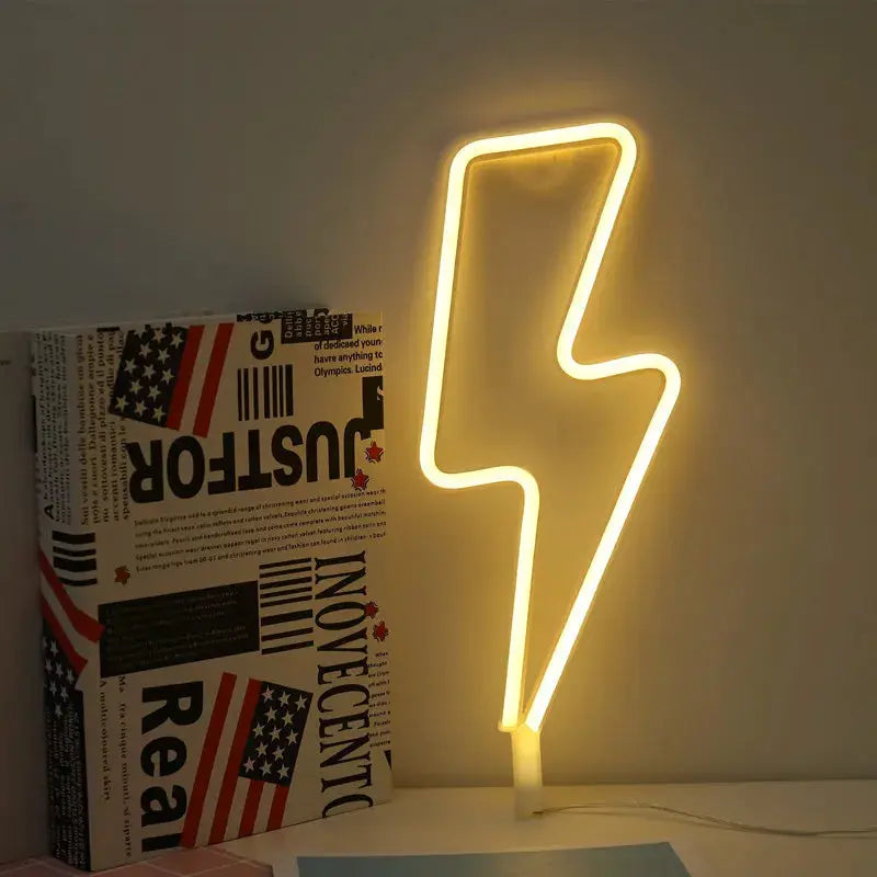 Neon wall light in a lightning bolt shape, Simples Market decorative piece, USB or battery powered, warm yellow glow