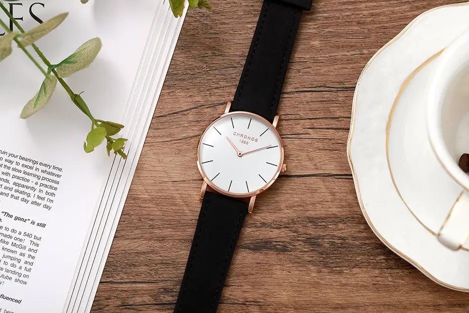 CHRONOS watch with rose-gold case and black leather strap, minimalist white dial