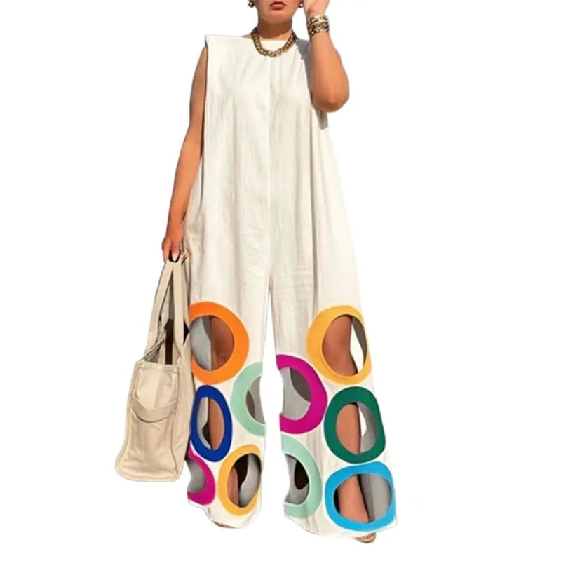 Women's white sleeveless wide-leg jumpsuit with rainbow circular cutouts at the hem.