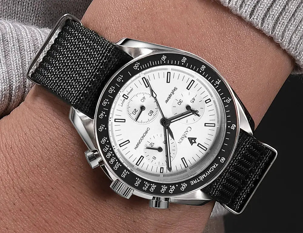 CADISEN men's chronograph wristwatch with white dial, black tachymeter bezel, stainless steel case and black canvas strap