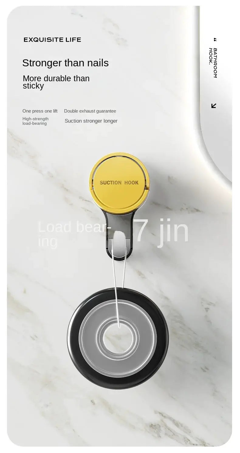 Strong Vacuum Suction Hook with gold round top and black mounting on marble wall; no drilling