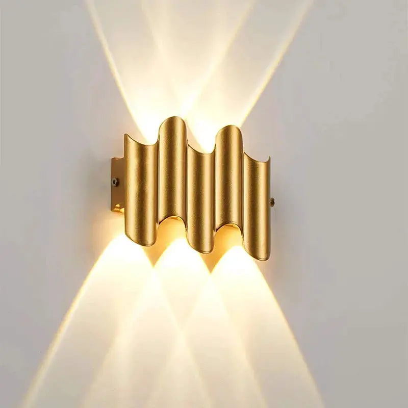 Aluminum golden LED wall light with a wavy bar design; outdoor IP65 waterproof sconce with up and down light for porch.