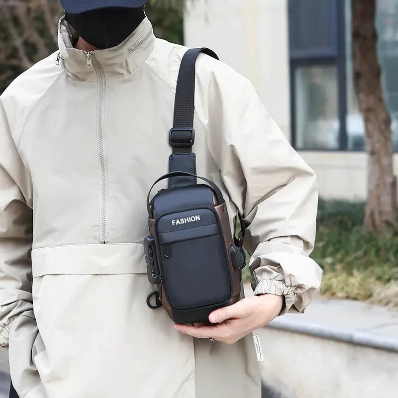 Men's anti-theft chest bag crossbody with front pocket, black panel and brown trim