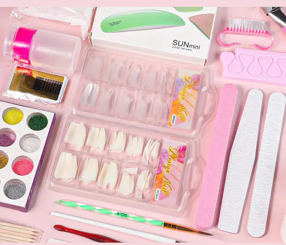 Acrylic nail art kit by Simples Market with clear tips, pink files, glitter powders, and manicure tools