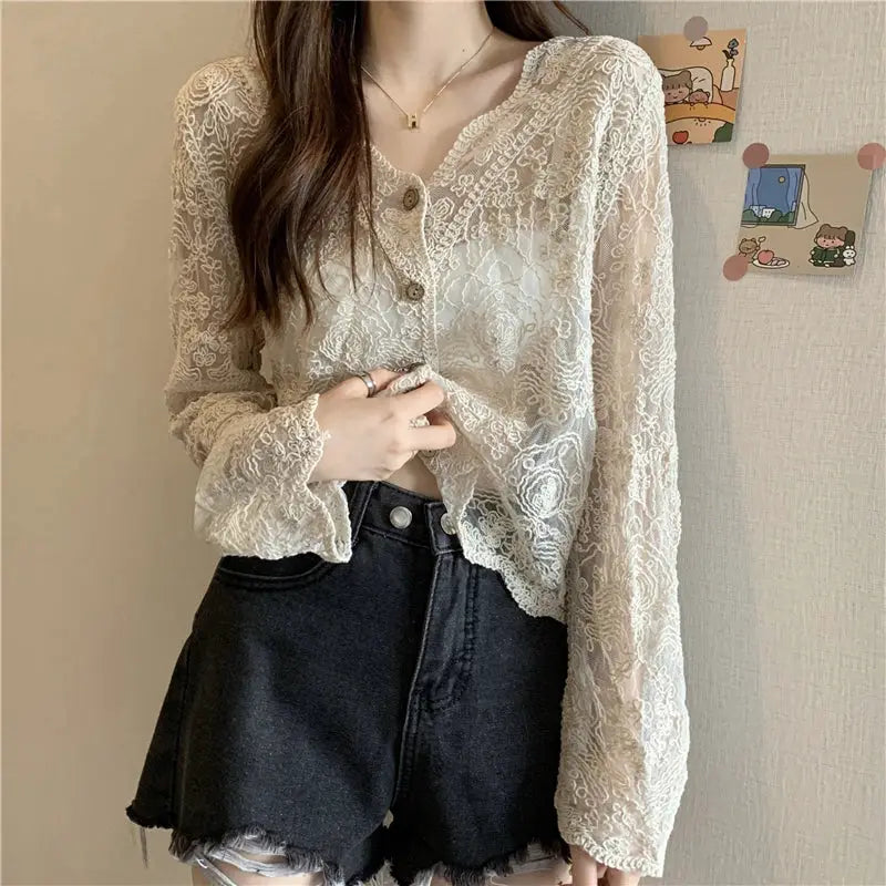Vintage cream lace blouse for women with sheer long sleeves and button-front detail