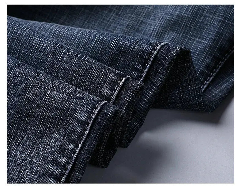 Wthinlee men's denim jeans, straight stretch fit in dark blue wash, folded