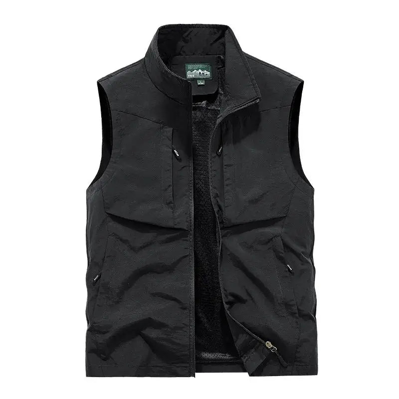 Men's black outdoor cargo vest with multiple pockets and mesh lining.