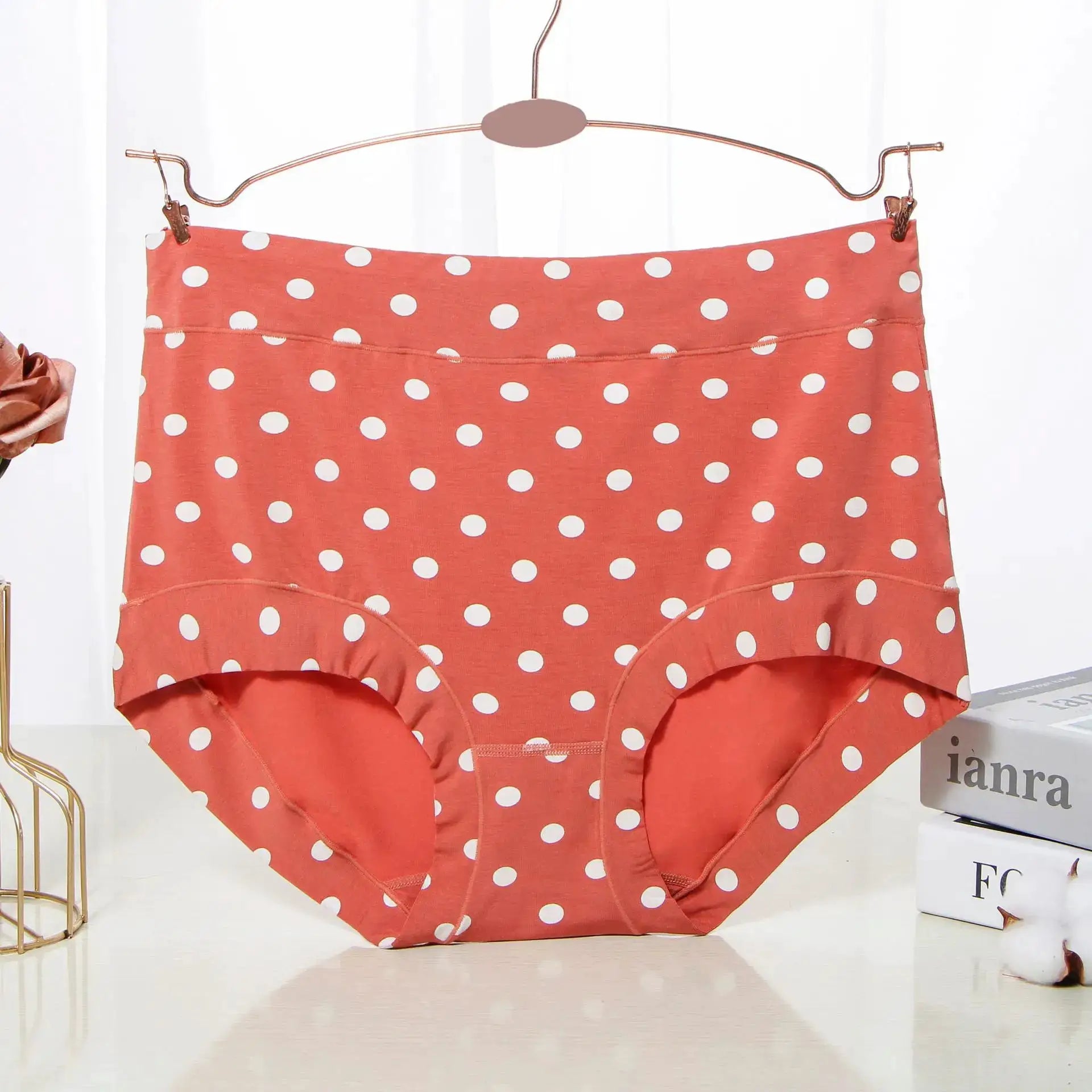 Polka dot high-waist panties in coral with white spots, modal fabric, women's underwear on a hanger