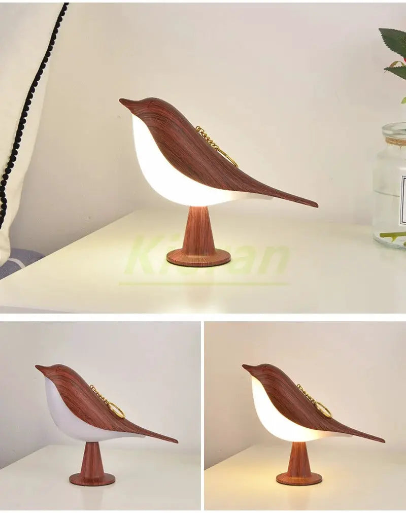 Nordic Magpie LED desk lamp by Simples Market; wooden bird silhouette with white belly on a pedestal base, warm light