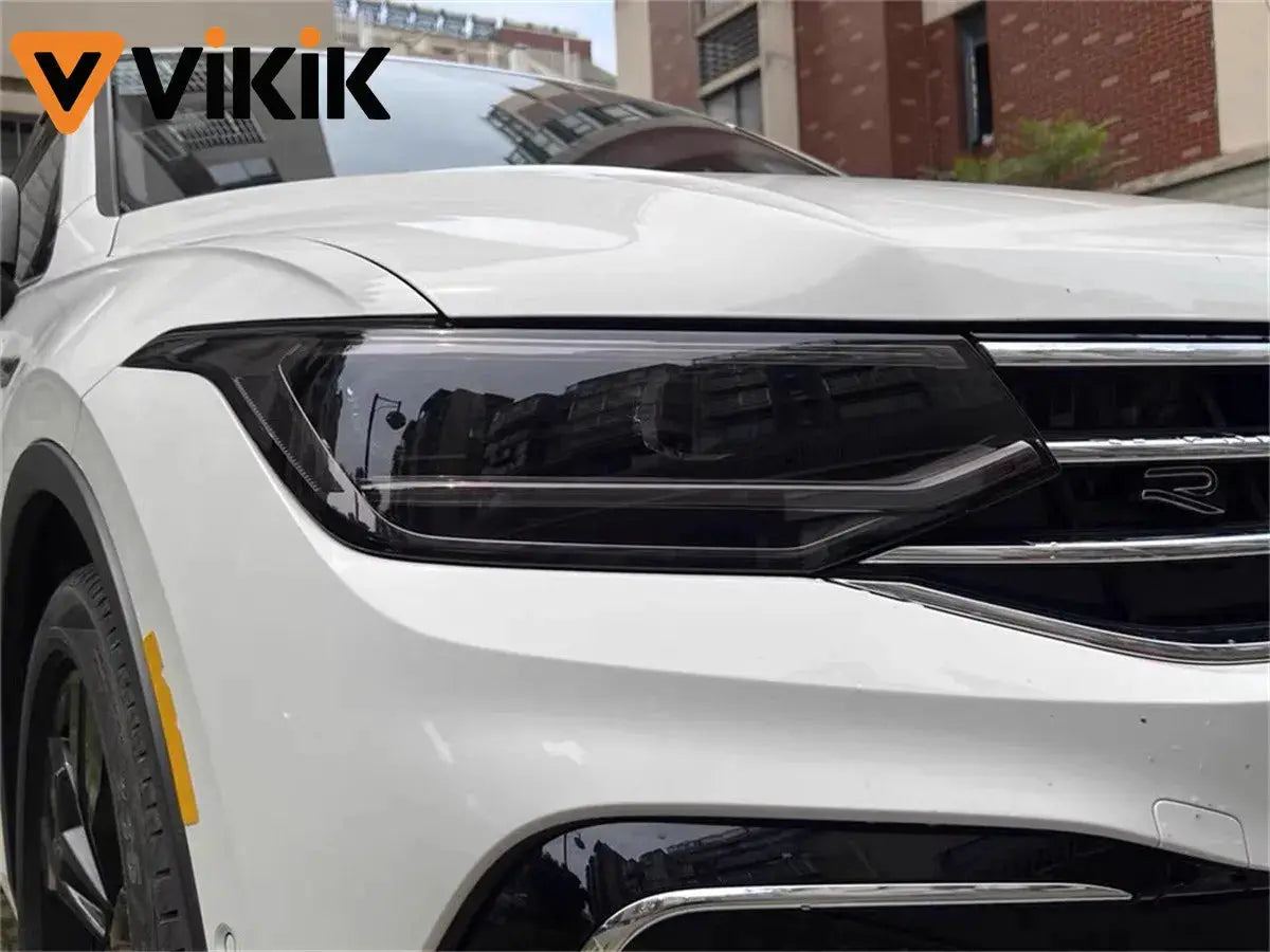 Headlight tint wrap film for car; transparent light PVC film with smoked black finish, VIKIK logo visible