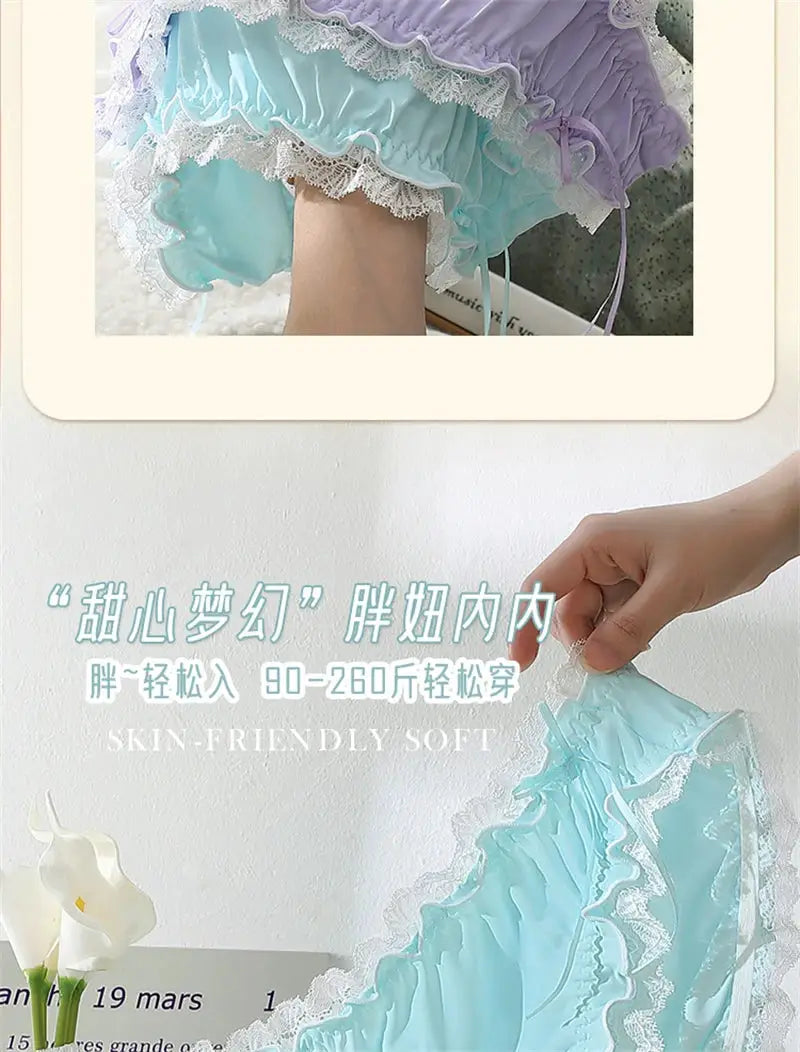 Plus-size pastel blue lace panties with white lace trim and ruffled edges
