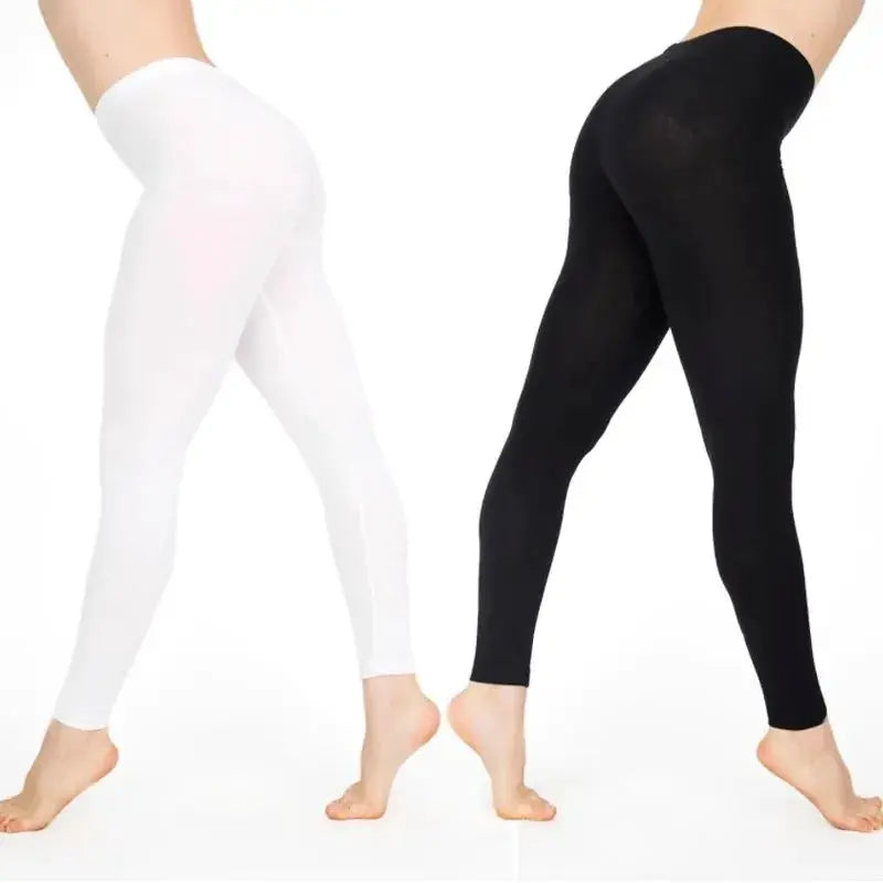 Women’s elastic waist leggings, white and black shiny high-stretch gym pants, two pairs shown.