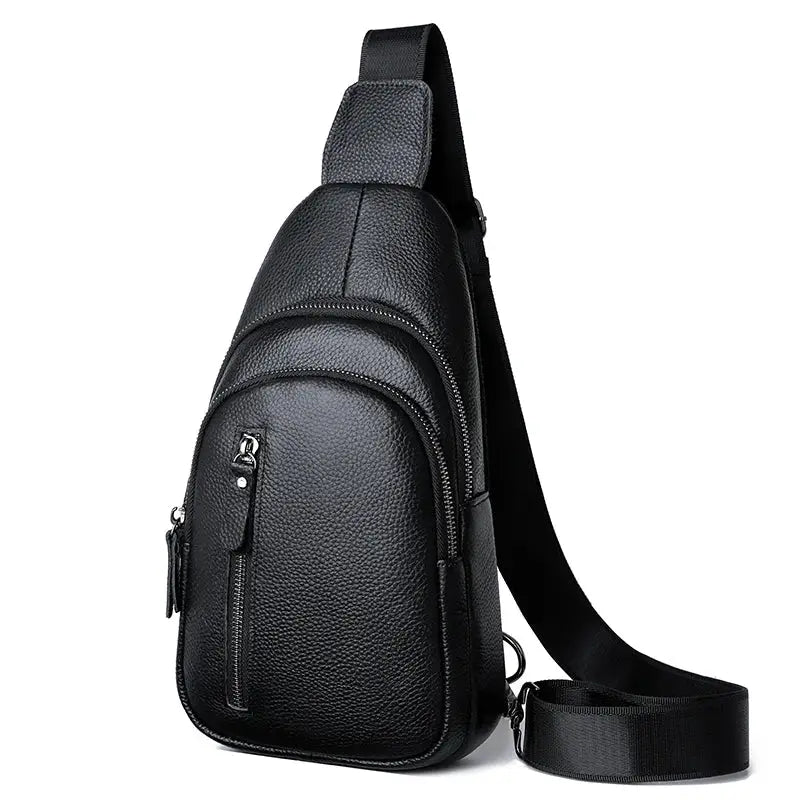 Leather men's chest bag by Simples Market in black with crossbody strap and multiple zipper pockets.