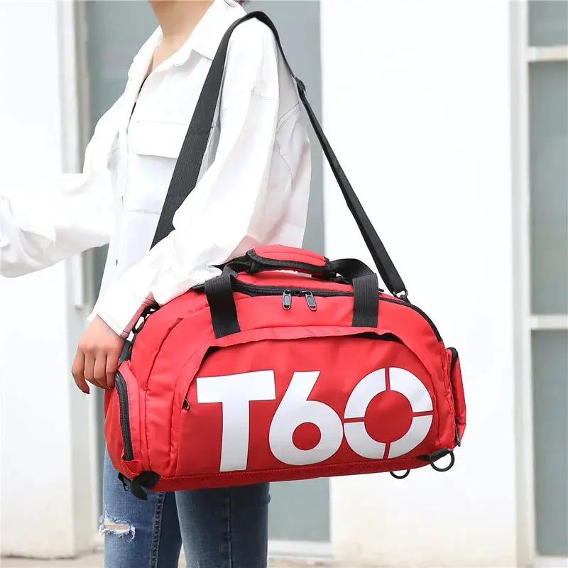 Red gym bag with black straps and large T60 graphic.