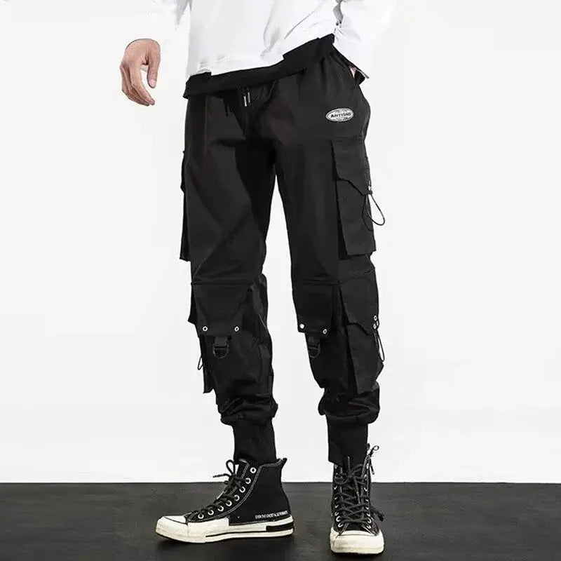 Men's black cargo pants by Simples Market with multiple pockets and drawstring waist