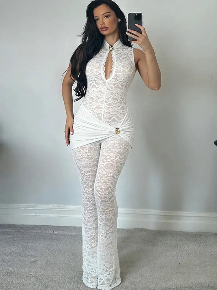Simples Market white lace jumpsuit with ruched waist, halter neck and gold knot detail.