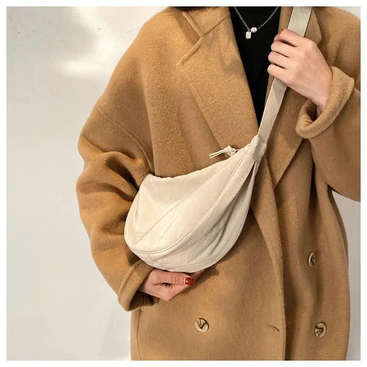 Casual nylon hobo crossbody bag in cream by Simples Market.