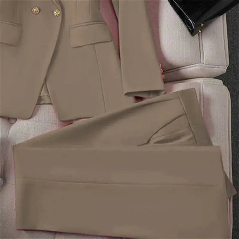 Beige two-piece blazer and pant set for women, office-appropriate long-sleeve suit