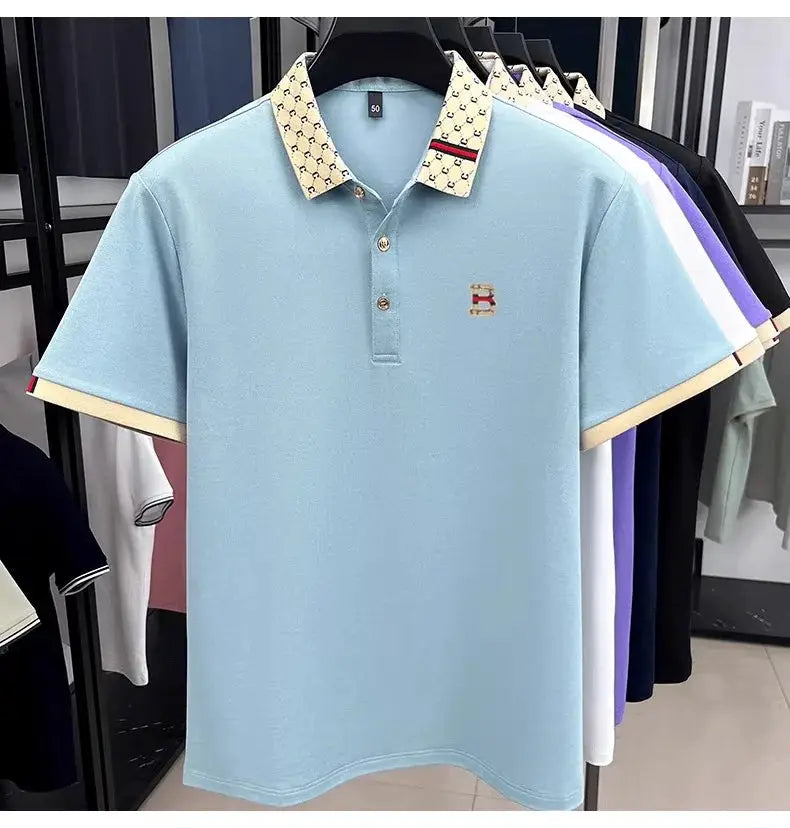 Polo shirt by Simples Market; light blue with beige patterned collar and B-logo on chest