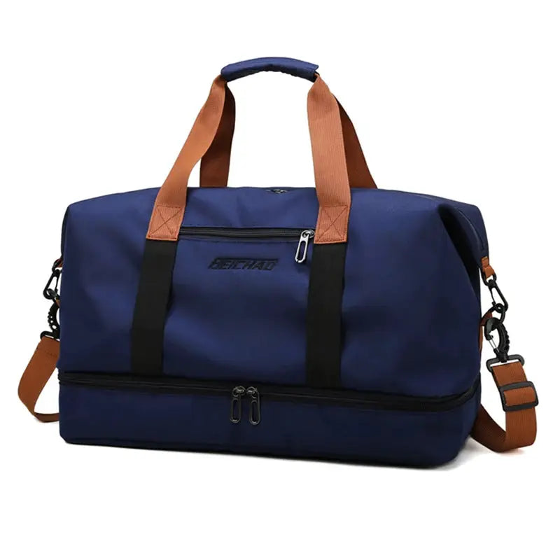 Expandable travel duffle bag for women, navy blue with tan handles and detachable shoulder strap