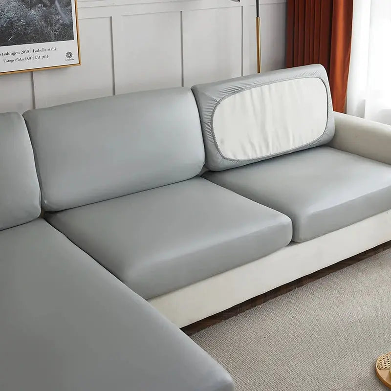 Corner sofa slipcover by Simples Market in light gray PU waterproof fabric with elastic stretch
