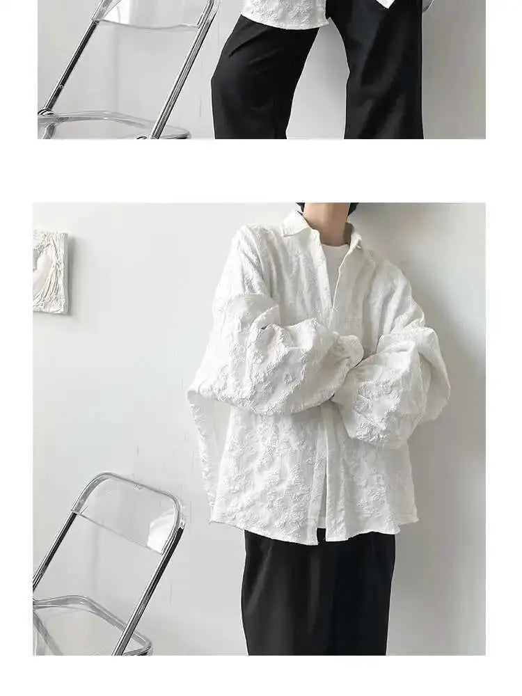 2XL white crumpled jacquard shirt with turn-down collar and bat-wing sleeves, loose fit, shown with black pants.
