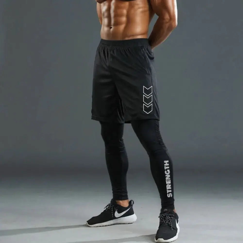 Men's 2-in-1 black compression sport pants with short outer shorts over full-length tights, white chevron accents