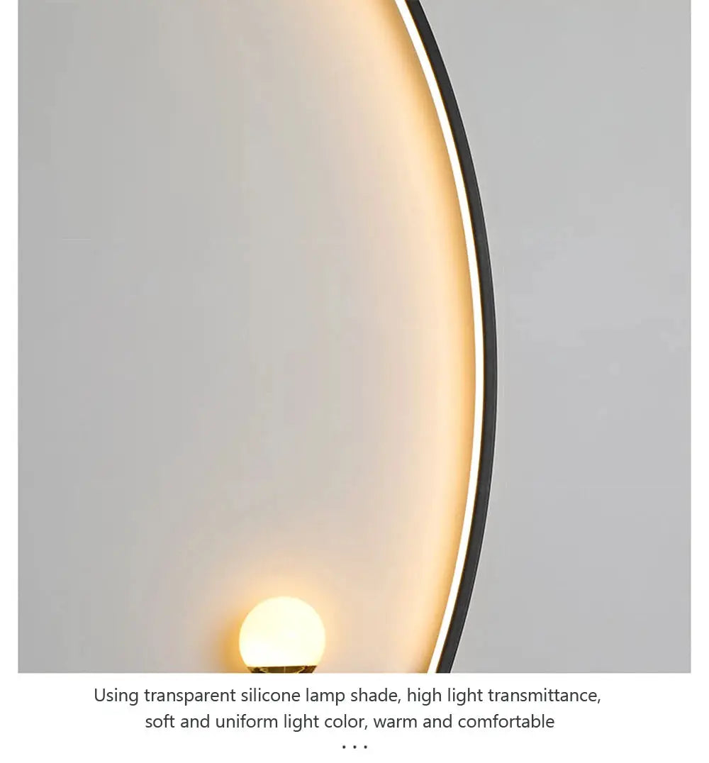 LED wall lamp, modern black circular ring with warm white LED glow, Simples Market