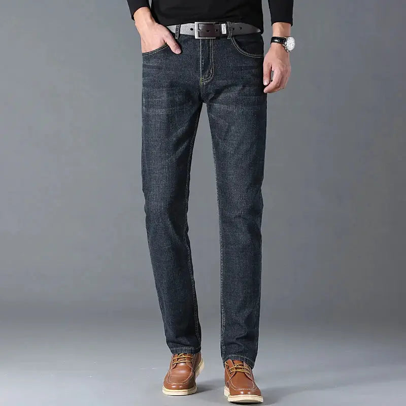 Men's dark blue denim jeans, straight-leg with stretch; five-pocket design with brown belt
