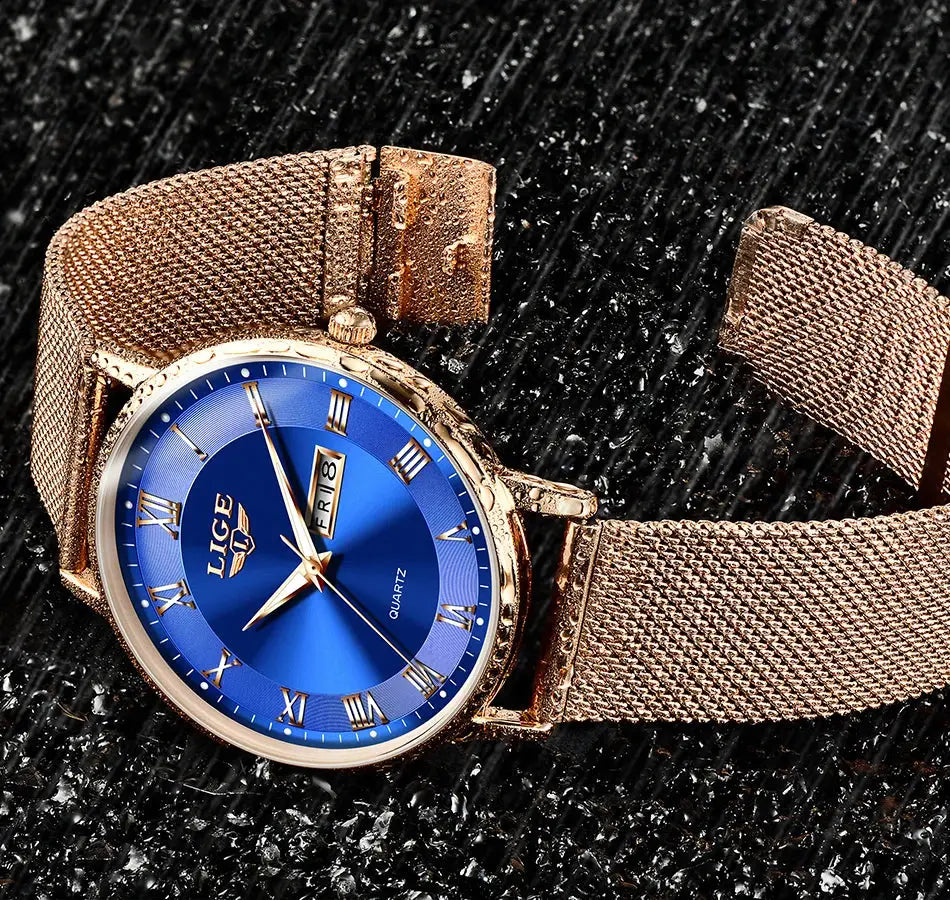 LIGE women's luxury steel-mesh watch with blue dial, rose-gold case, Roman numerals and date window.