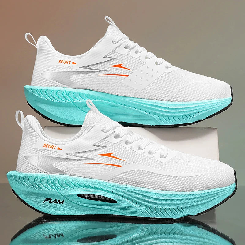 Pair of white running shoes with teal midsole, orange accents, breathable mesh upper