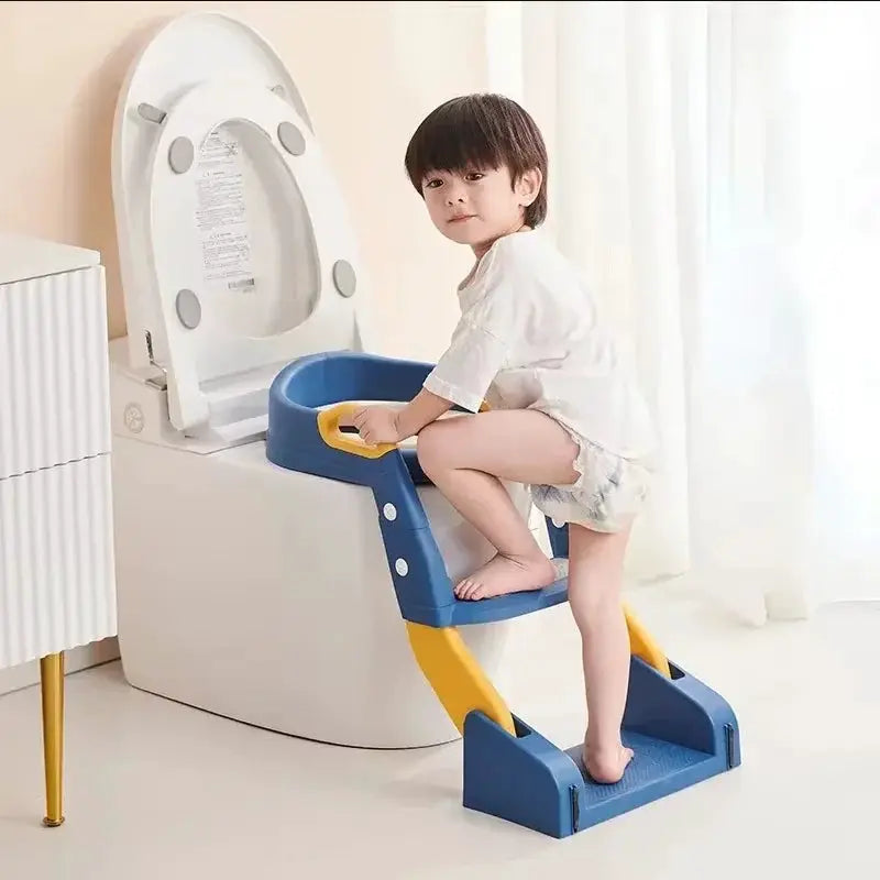 Toilet training foldable step stool for kids, blue and yellow, beside a toilet.