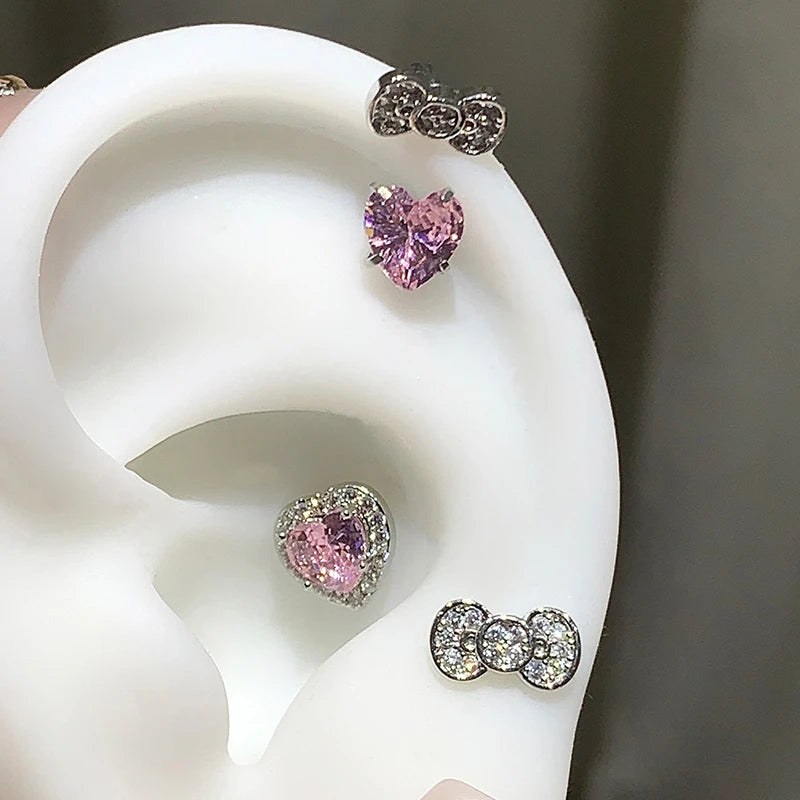 Cartilage ear studs set in 316L stainless steel with zircon; 4pcs: pink heart, heart gem, bowknot, crystal.