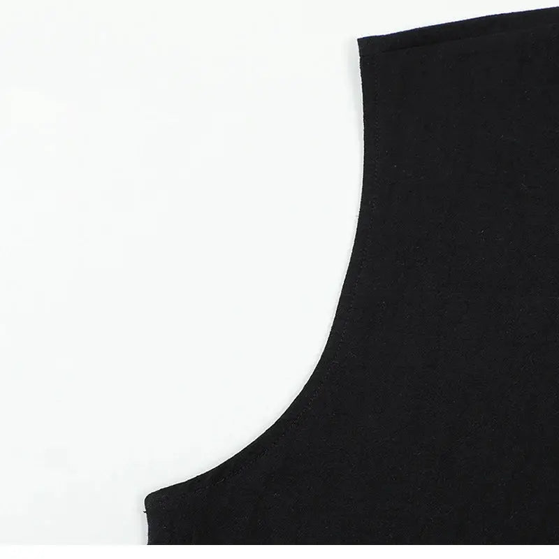 Black sleeveless cotton-linen shirt close-up of armhole on white background