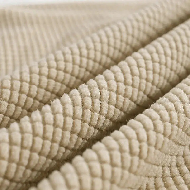 Bed headboard cover gray polar fleece with elastic, solid textured fabric.
