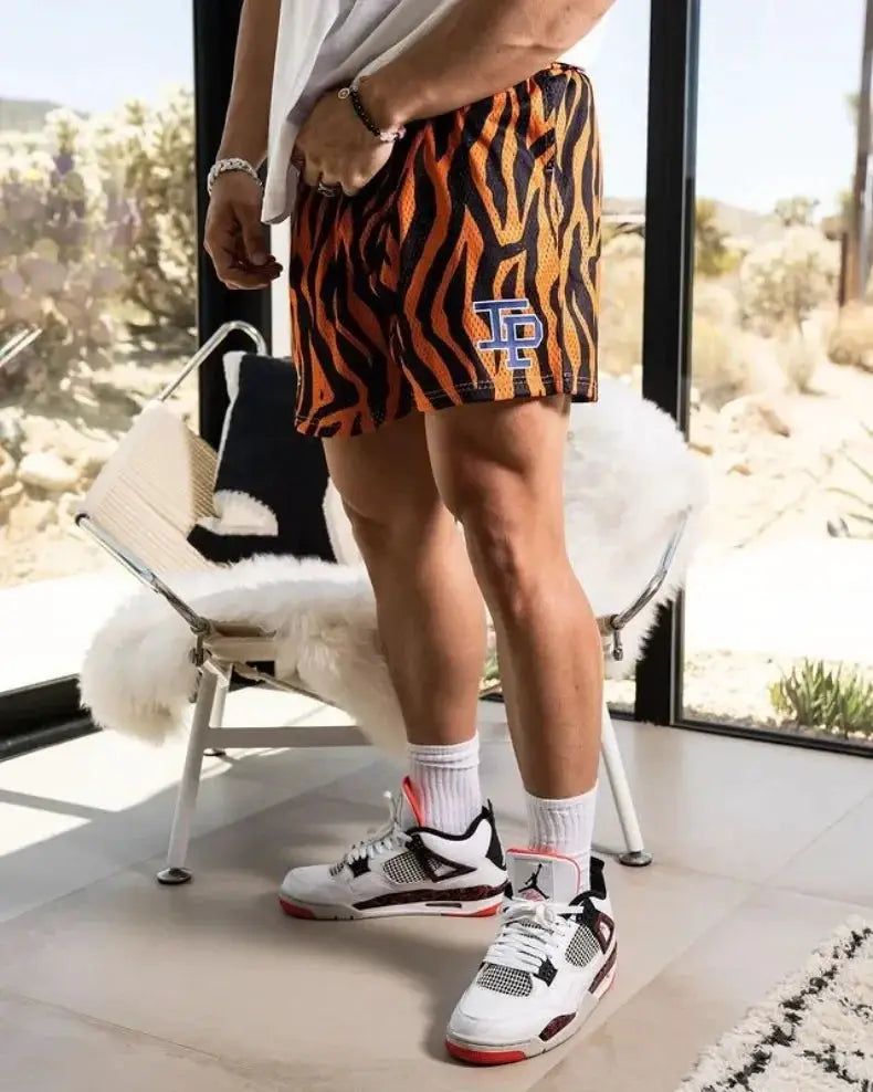 Mens motorcycle shorts in orange tiger print, quick-dry breathable mesh by Simples Market.