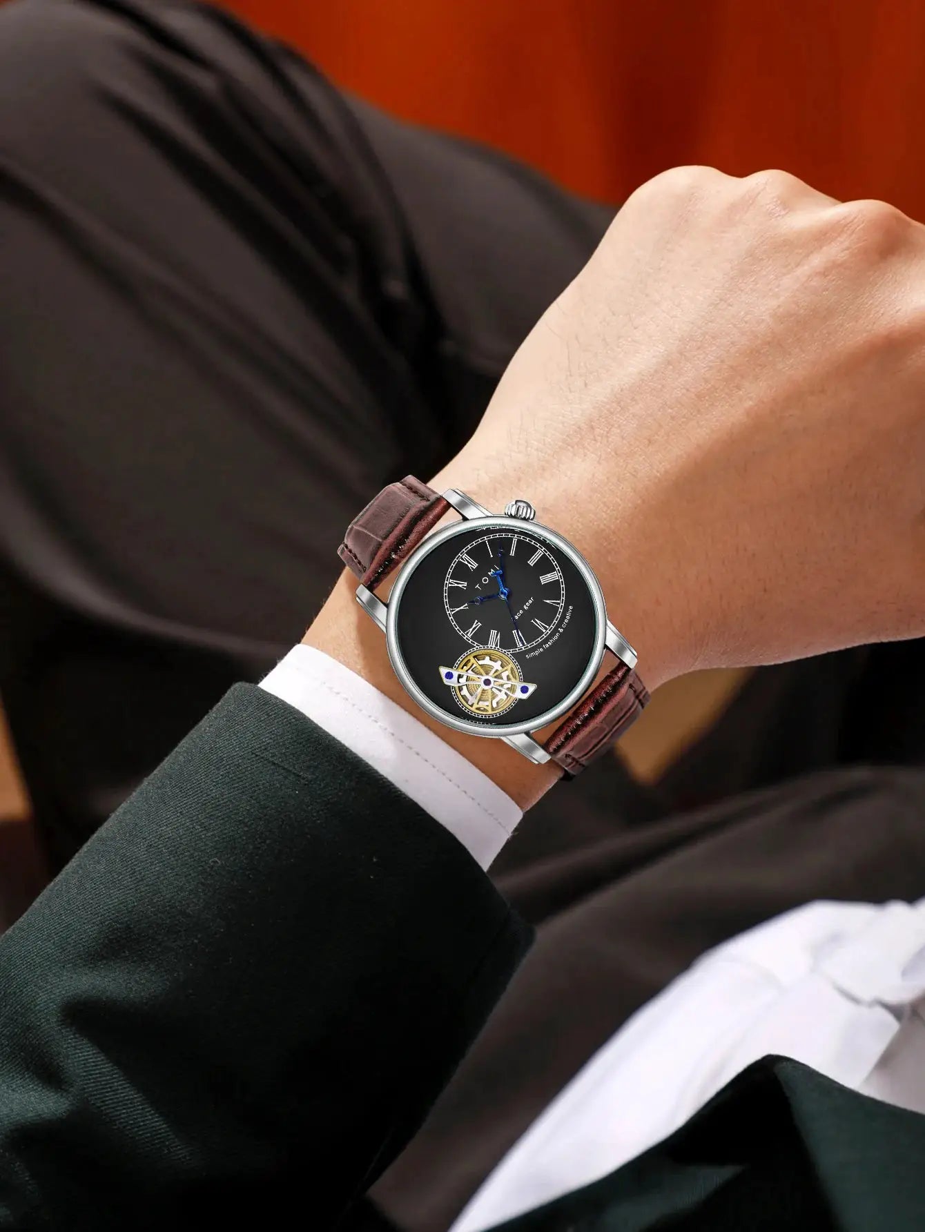 TOMI men's quartz wristwatch with brown leather strap, silver case, black dial