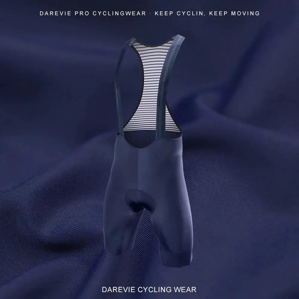 DAREVIE men's cycling bib shorts in navy blue with striped suspenders.