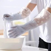 Floral-pattern latex cleaning gloves by Simples Market; waterproof, daisy print for kitchen and laundry.