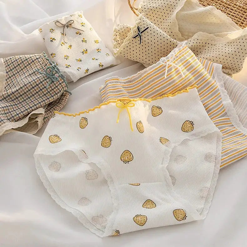 Cotton women's briefs set of 6 in assorted prints with lace trim and mid-waist design.