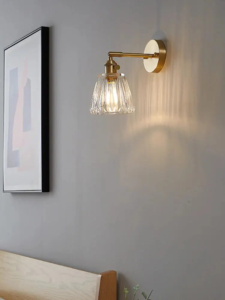 Brass glass wall sconce with a ribbed crystal shade; Nordic modern bedside lamp for bedroom or living room