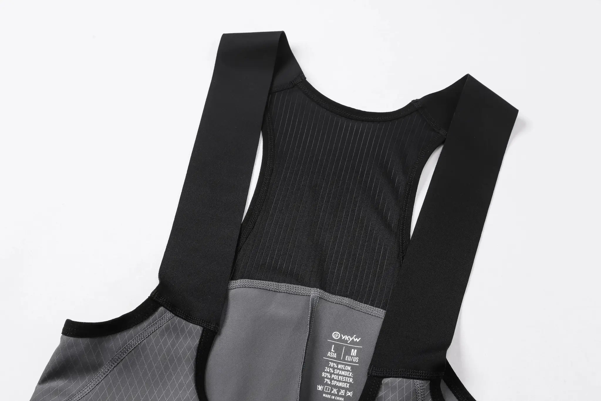 YKYW cycling bib shorts with wide black straps and pinstriped fabric