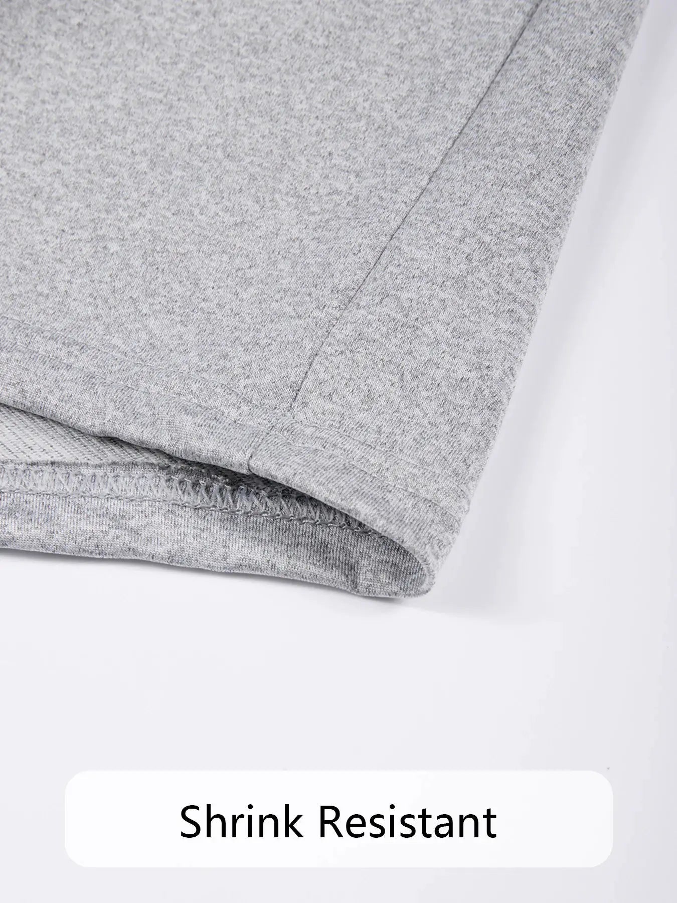 Men's grey cotton jogger shorts, casual streetwear style with textured fabric close-up
