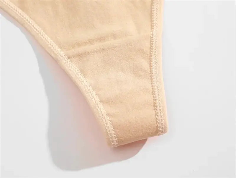Women's seamless cotton thong panties, beige, low-rise V-waist, breathable